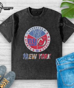 Premium New York Yankees, New York Giants, and New Jersey Devils mashup logo on a washed t-shirt.