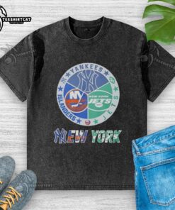 Premium New York Yankees, Islanders, Jets, and Knicks mashup logo on a washed t-shirt, perfect for sports fans.