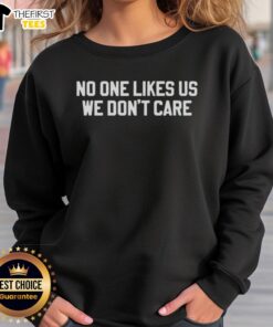 Premium Philadelphia Eagles sweatshirt featuring 'No One Likes Us, We Don't Care' slogan, perfect for fans.