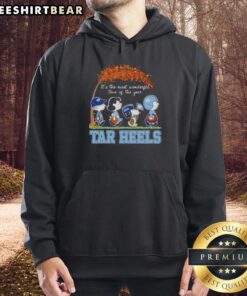 Alt Text: Premium North Carolina Tar Heels hoodie featuring Snoopy and friends, perfect for autumn and cozy celebrations.