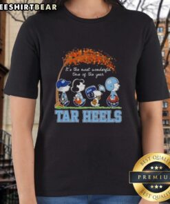 Premium North Carolina Tar Heels X Peanuts Snoopy and Friends Autumn tee for ladies, perfect for fall celebrations.