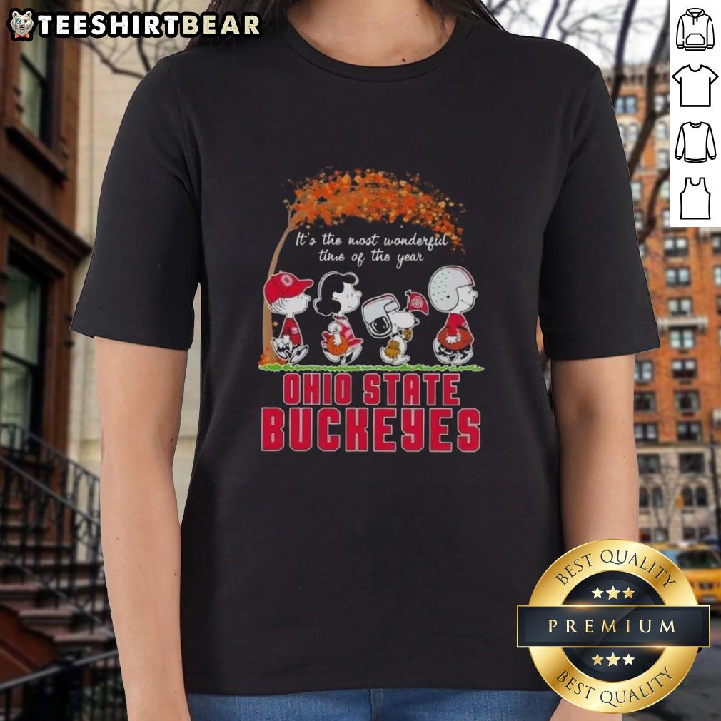 premium-ohio-state-buckeyes-x-peanuts-snoopy-and-friends-autumn-its-the-most-wonderful-time-ladies-tee Alt Text: Premium Ohio State Buckeyes X Peanuts Snoopy and Friends autumn ladies tee, perfect for fall festivities.