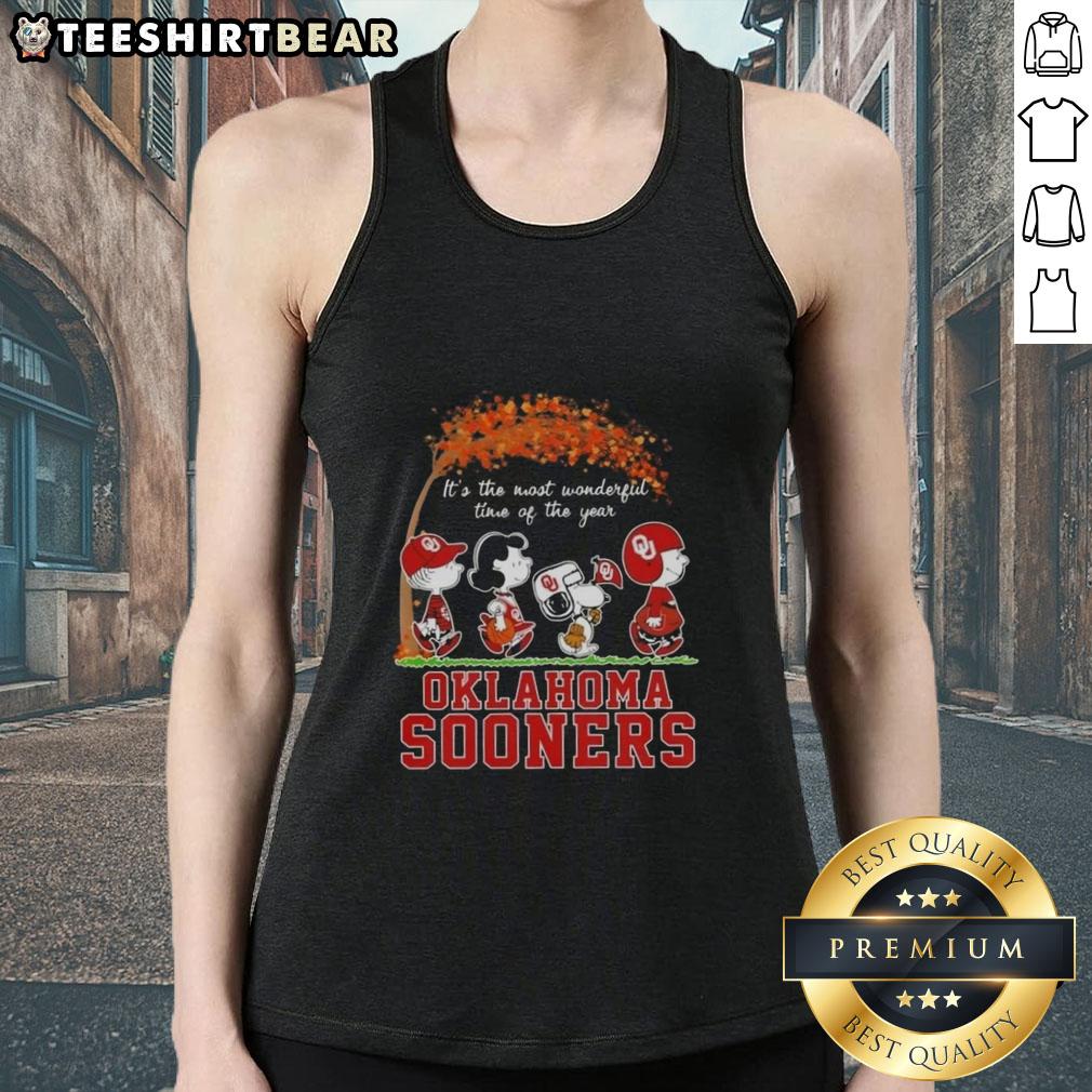 premium-oklahoma-sooners-x-peanuts-snoopy-and-friends-autumn-its-the-most-wonderful-time-of-the-year-tank-top Premium Oklahoma Sooners X Peanuts Snoopy tank top for autumn featuring 'It's the Most Wonderful Time of the Year' design.