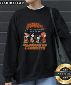 Alt Text: Premium Oklahoma State Cowboys X Peanuts Snoopy and Friends Autumn sweatshirt featuring vibrant fall designs.