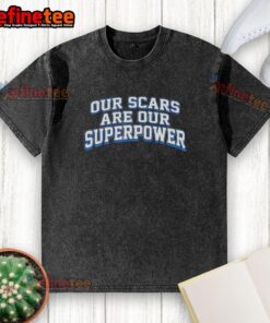 Premium washed t-shirt featuring the phrase 'Our Scars Are Our Superpower' in stylish typography.
