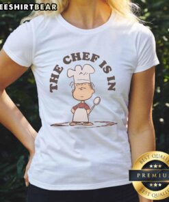 Premium Peanuts Linus the Chef Ladies Tee featuring playful design and comfortable fit for casual wear.