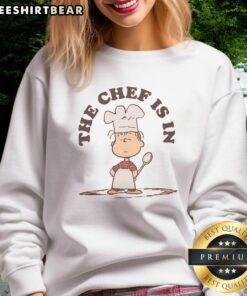 Premium Peanuts Linus the Chef sweatshirt featuring colorful graphics and cozy design for fans of Peanuts characters.