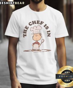 Alt Text: Premium Peanuts Linus The Chef T-Shirt featuring a whimsical chef design, perfect for fans of Peanuts characters.