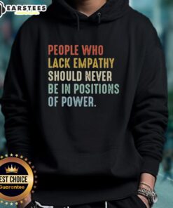 Premium hoodie with the phrase 'People Who Lack Empathy Should Never Be In Positions Of Power' printed boldly.