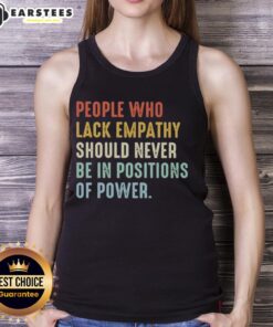 Premium tank top with 'People Who Lack Empathy Should Never Be In Positions Of Power' printed in bold letters.