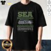 Premium Seattle Seahawks Holiday T-Shirt featuring festive design and team colors for fans celebrating the season.