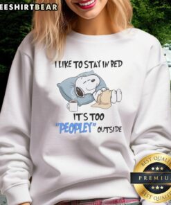 Premium Snoopy sweatshirt with 'I Like To Stay In Bed It's Too Peopley Outside' design, perfect for cozy days.