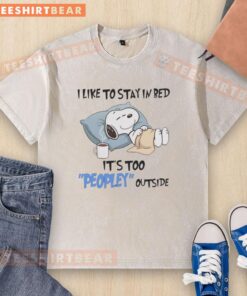 Premium Snoopy t-shirt featuring 'I Like To Stay In Bed, It's Too Peopley Outside' design in a washed style.