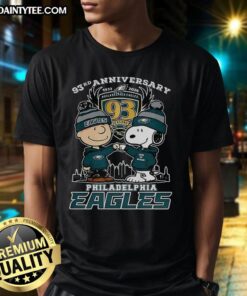 Alt Text: Premium Snoopy Touch Hands Charlie Brown X Philadelphia Eagles 93rd Anniversary T-Shirt, celebrating 1933-2026.