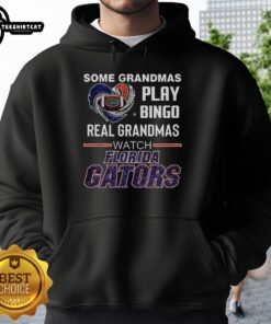 Alt Text: Real Grandmas in Florida Gators hoodie enjoying bingo, showcasing premium style and fun.