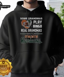 Premium hoodie featuring grandmas playing bingo while supporting Miami Hurricanes, perfect for fans and comfort lovers.