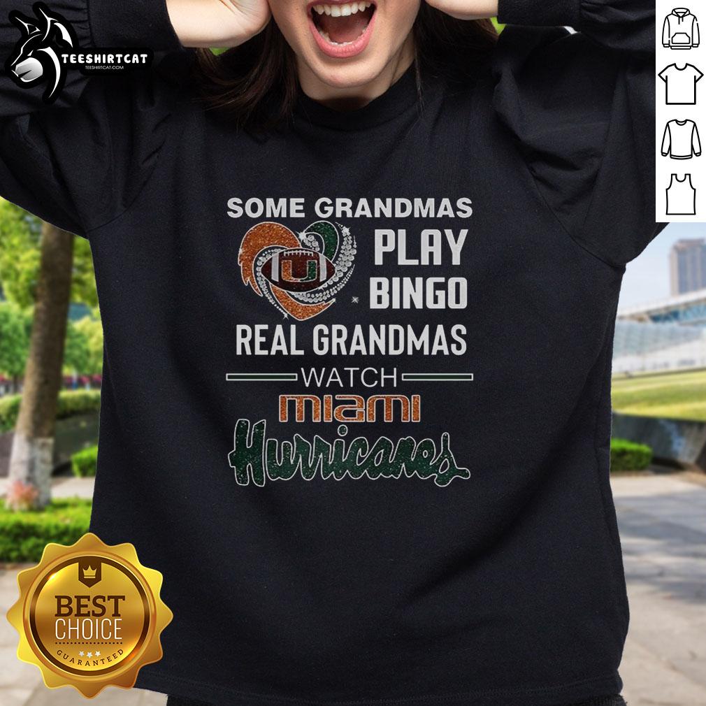 premium-some-grandmas-play-bingo-real-grandmas-watch-miami-hurricanes-sweatshirt Premium sweatshirt featuring grandmas playing bingo while watching Miami Hurricanes game, perfect for sports fans.