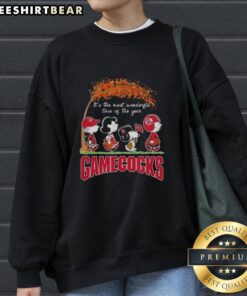 Alt Text: Premium South Carolina Gamecocks X Peanuts Snoopy and Friends sweatshirt for autumn, celebrating the season's joy.