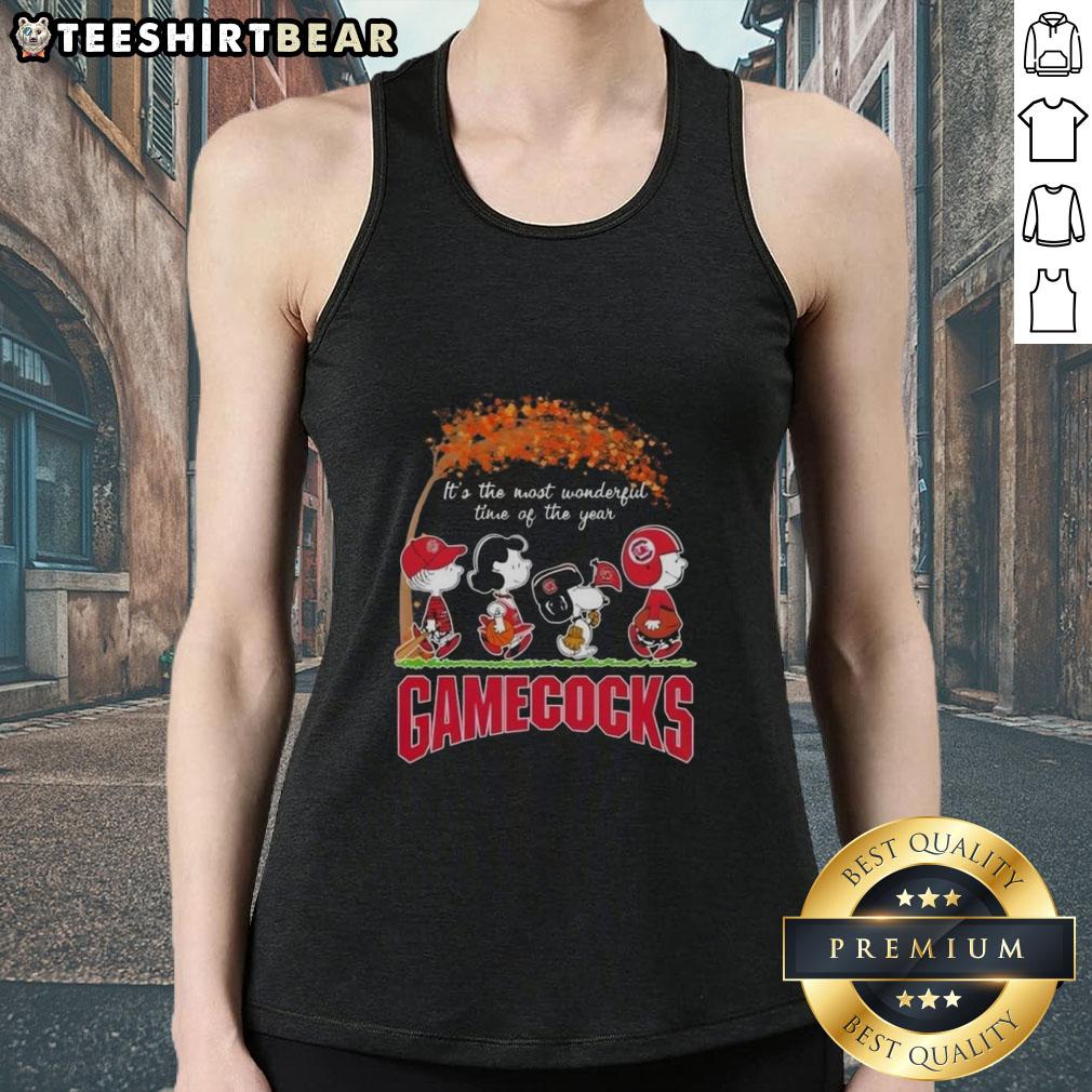 premium-south-carolina-gamecocks-x-peanuts-snoopy-and-friends-autumn-its-the-most-wonderful-time-tank-top Alt Text: Premium South Carolina Gamecocks tank top featuring Snoopy and friends, perfect for autumn celebrations.