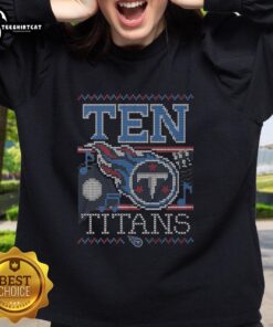 Alt Text: Premium Tennessee Titans holiday sweatshirt featuring team colors and logo, perfect for festive football fans.