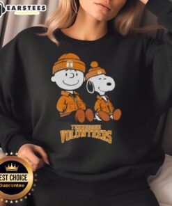 Premium Tennessee Volunteers X Snoopy and Charlie Brown sweatshirt featuring vibrant team colors and playful design.