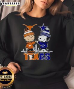 Alt Text: Premium Texas City skyline sweatshirt featuring Charlie Brown, Texas Longhorns, and Dallas Cowboys designs.