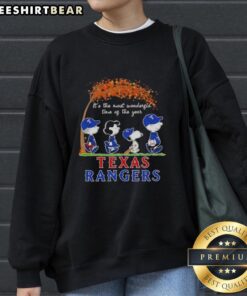 Premium Texas Rangers X Peanuts Snoopy and Friends autumn sweatshirt celebrating the most wonderful time of the year.
