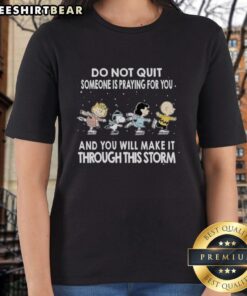 Alt Text: Premium Peanuts tee featuring 'Do Not Quit' message and prayer theme for encouragement during tough times.