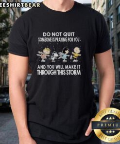 Alt Text: Premium Peanuts 'Do Not Quit' T-Shirt with inspiring message: 'Someone is Praying For You, You Will Make It Through This Storm.'