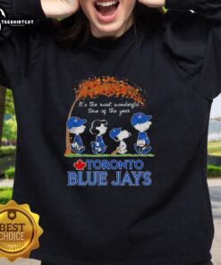 Alt Text: Premium Toronto Blue Jays x Peanuts Snoopy and Friends sweatshirt, perfect for autumn and holiday cheer.