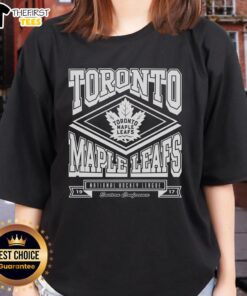 Premium Toronto Maple Leafs heater ladies tee in vibrant blue, showcasing team logo and stylish design for fans.