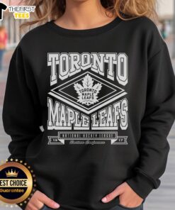 Alt Text: Premium Toronto Maple Leafs heater sweatshirt in navy blue, featuring team logo and cozy design for fans.