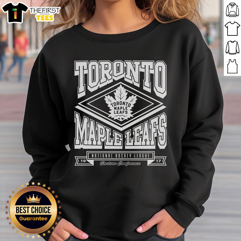 premium-toronto-maple-leafs-heater-sweatshirt Alt Text: Premium Toronto Maple Leafs heater sweatshirt in navy blue, featuring team logo and cozy design for fans.