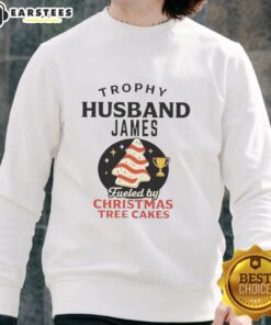 Premium Trophy Husband James sweatshirt featuring Christmas Tree Cakes design, perfect for holiday celebrations.