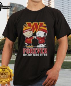 Alt Text: Premium Washington Commanders X Charlie Brown Vs Snoopy T-Shirt featuring a playful design celebrating fandom.