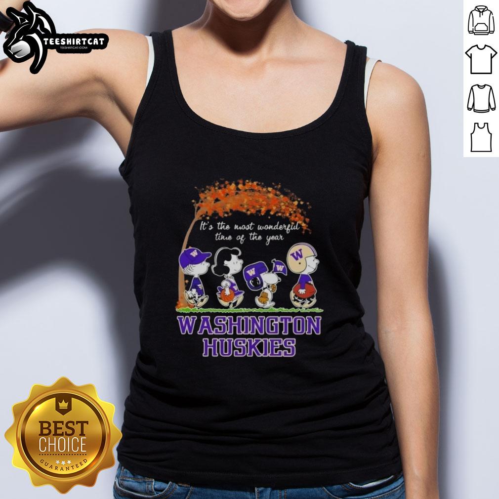 premium-washington-huskies-x-peanuts-snoopy-and-friends-autumn-its-the-most-wonderful-time-of-the-year-tank-top Alt Text: Premium Washington Huskies X Peanuts Snoopy and Friends autumn tank top featuring festive holiday designs.