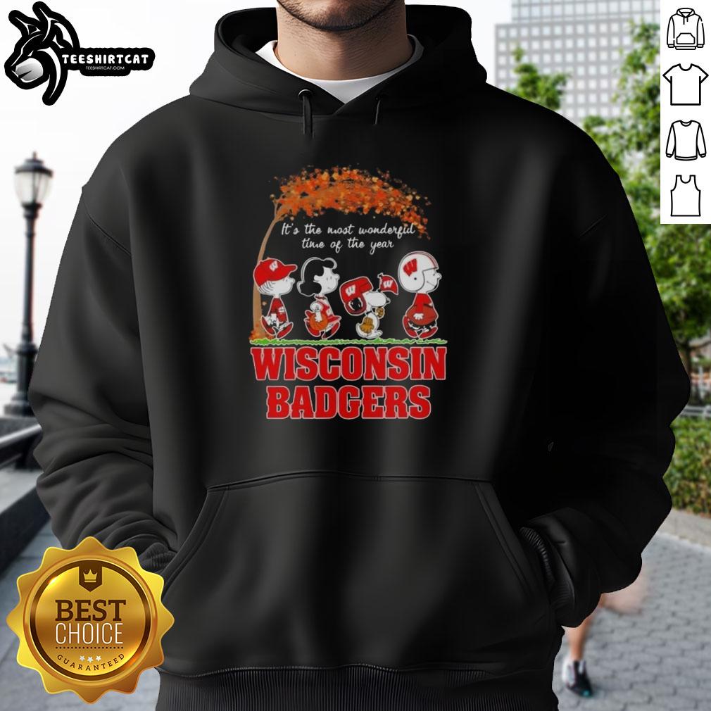 premium-wisconsin-badgers-x-peanuts-snoopy-and-friends-autumn-its-the-most-wonderful-time-hoodie Alt Text: Premium Wisconsin Badgers X Peanuts Snoopy and Friends autumn hoodie featuring festive designs for fall celebrations.