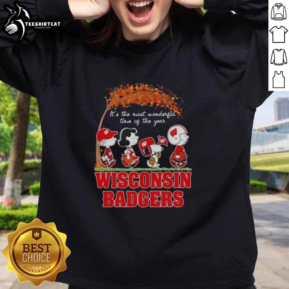 premium-wisconsin-badgers-x-peanuts-snoopy-and-friends-autumn-its-the-most-wonderful-time-sweatshirt Premium Wisconsin Badgers X Peanuts Snoopy and Friends autumn sweatshirt, perfect for cozy fall days and sports fans.