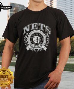 Stylish Brooklyn Nets NBA crest t-shirt featuring the team's logo and modern design, perfect for basketball fans.