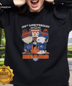 Alt Text: Pretty Charlie Brown and Snoopy sweatshirt celebrating 106th anniversary, featuring Chicago Bears skyline design.