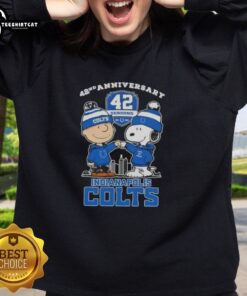 Alt Text: Pretty Charlie Brown and Snoopy 42nd Anniversary Indianapolis Colts football sweatshirt with skyline design.