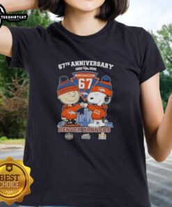 Alt Text: 'Pretty Charlie Brown and Snoopy 67th Anniversary Denver Broncos Football Skyline Ladies Tee design'