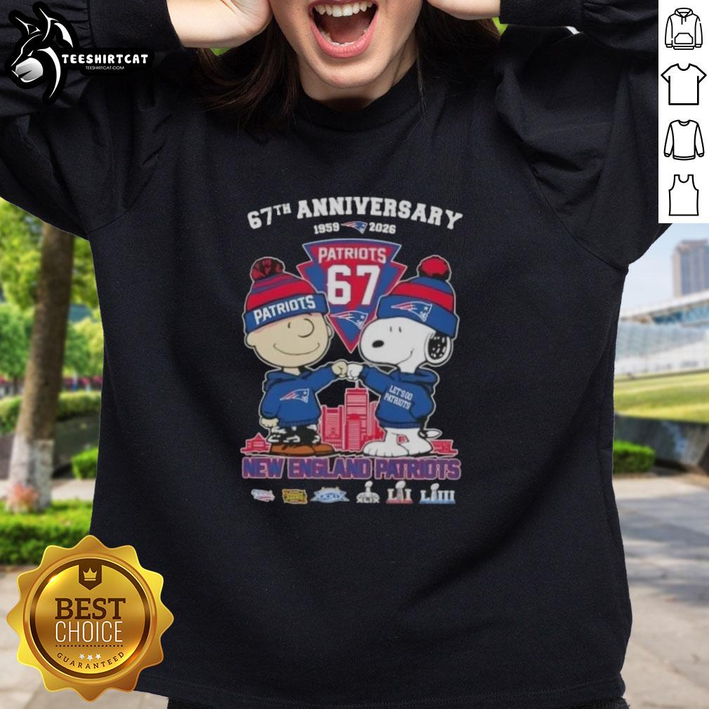 pretty-charlie-brown-and-snoopy-67th-anniversary-1959-2026-new-england-patriots-football-skyline-sweatshirt Alt Text: Pretty Charlie Brown and Snoopy 67th Anniversary sweatshirt featuring New England Patriots football skyline design.