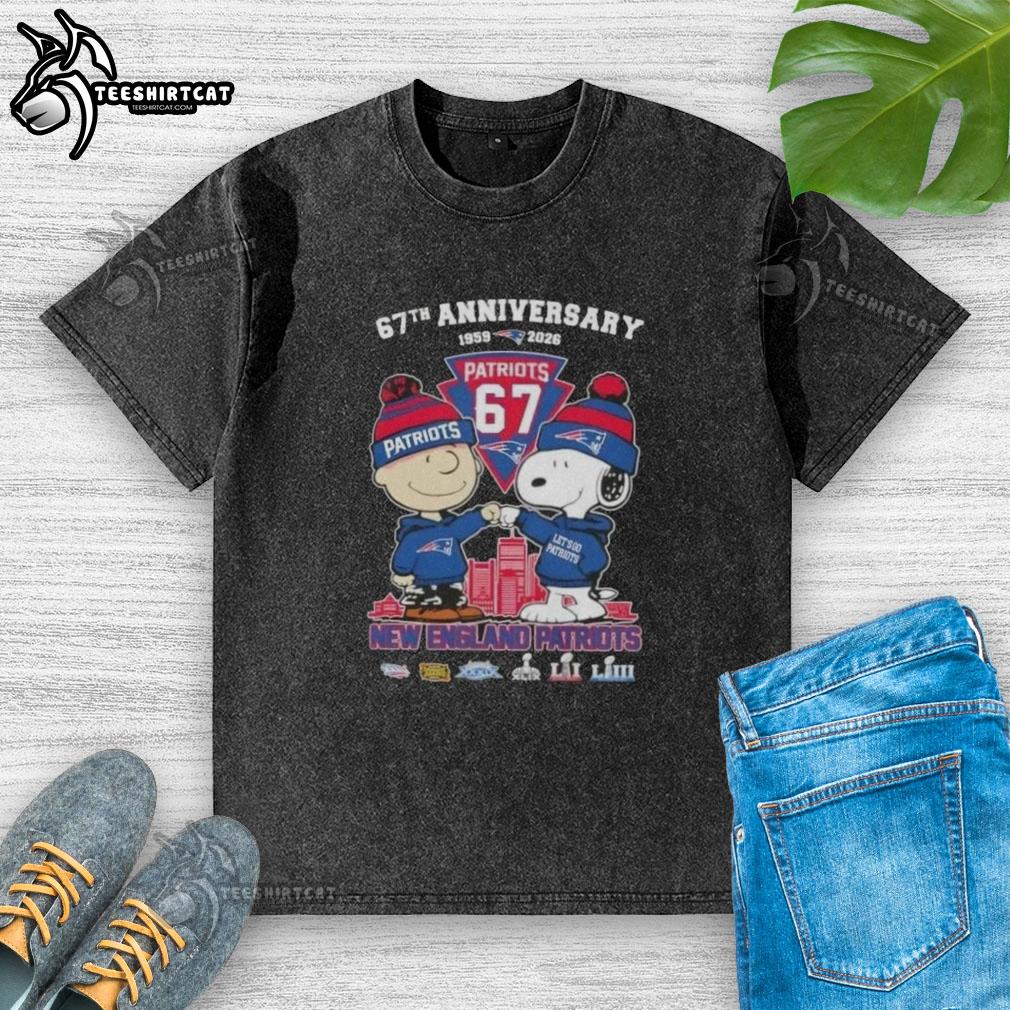 pretty-charlie-brown-and-snoopy-67th-anniversary-1959-2026-new-england-patriots-football-skyline-washed-t-shirt Alt Text: Pretty Charlie Brown and Snoopy 67th Anniversary t-shirt featuring New England Patriots football skyline design.