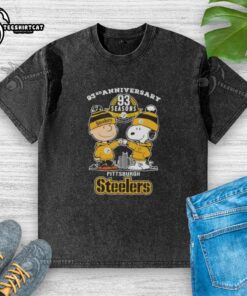 Alt Text: Pretty Charlie Brown and Snoopy 93rd Anniversary Pittsburgh Steelers Football Skyline Washed T-Shirt design.