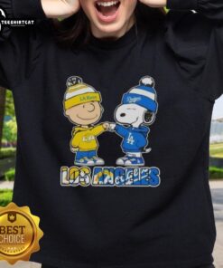 Alt Text: Pretty Charlie Brown fist bump with Snoopy on a Los Angeles Rams x Dodgers sweatshirt, perfect for sports fans.