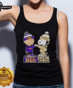 Pretty Charlie Brown fist bump with Snoopy in LSU Tigers x New Orleans Saints tank top, celebrating Louisiana sports.
