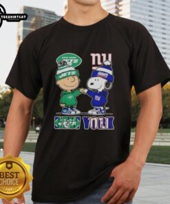 Pretty Charlie Brown fist bump with Snoopy on a New York City Jets vs Giants sports t-shirt design.