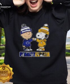 Alt Text: Pretty Charlie Brown fist bump with Snoopy on a Nittany Lions x Pittsburgh Penguins sweatshirt in Pennsylvania.