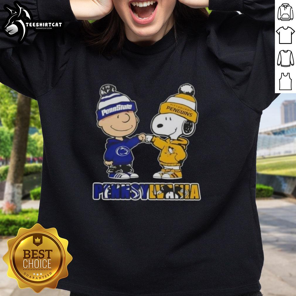pretty-charlie-brown-fist-bump-snoopy-pennsylvania-city-nittany-lions-x-pittsburgh-penguins-sweatshirt Alt Text: Pretty Charlie Brown fist bump with Snoopy on a Nittany Lions x Pittsburgh Penguins sweatshirt in Pennsylvania.